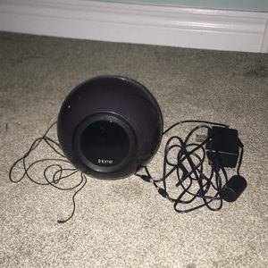 IHome light up alarm clock. Comes with power cord, iphone plug connecting cord.